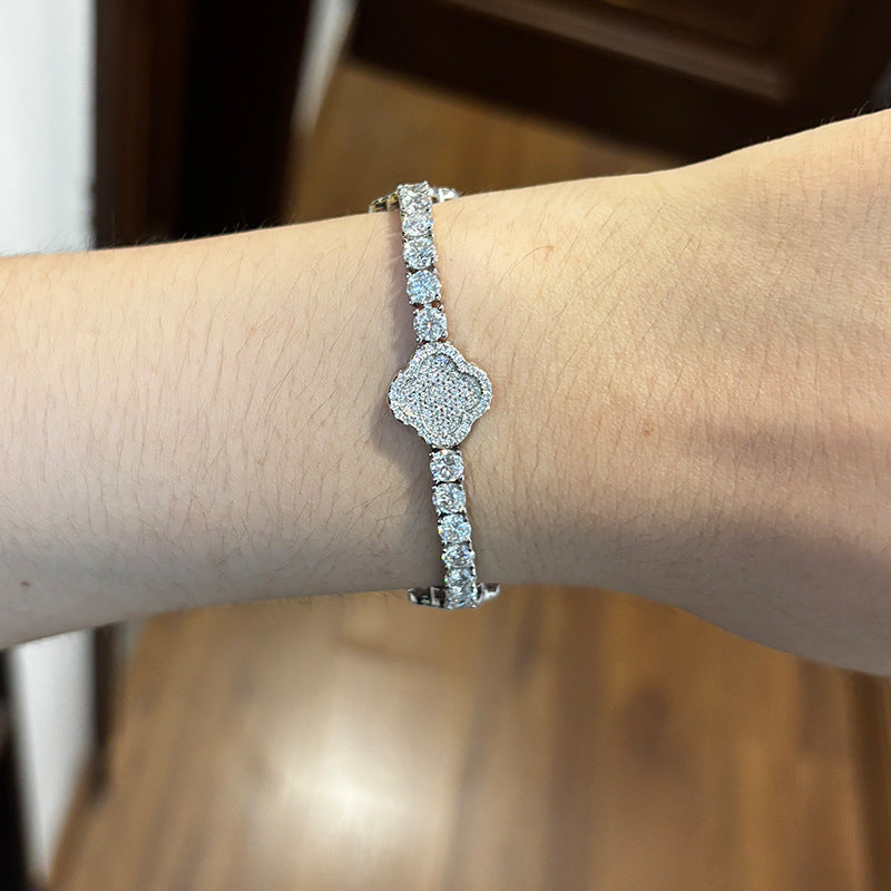 Alora clover moissanite bracelet worn on wrist