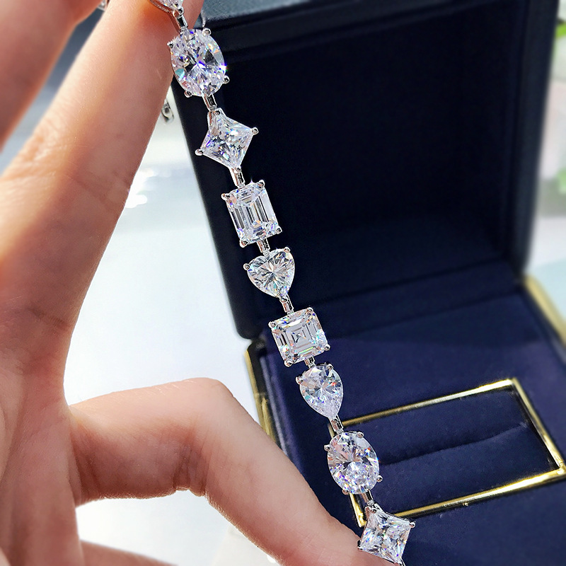 Celeste bracelet with heart pear round and emerald moissanite stones
