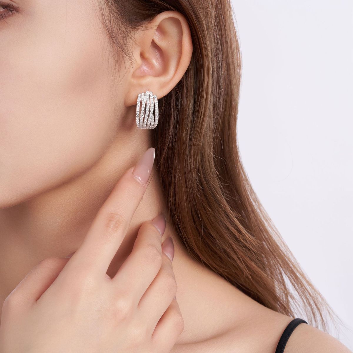 VANLARA Aurea moissanite U hoop earrings worn on ear