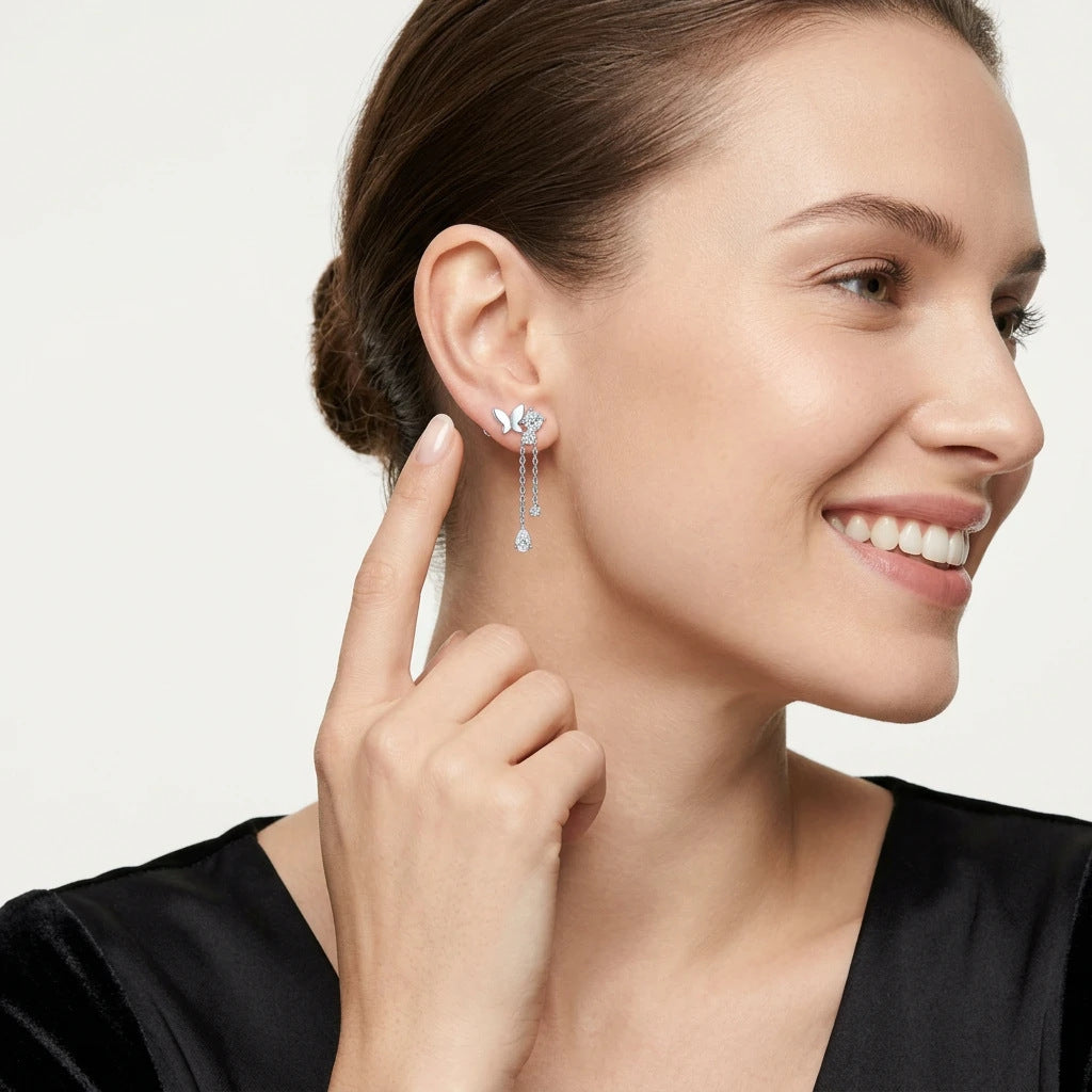 VANLARA butterfly tassel moissanite earrings worn on model