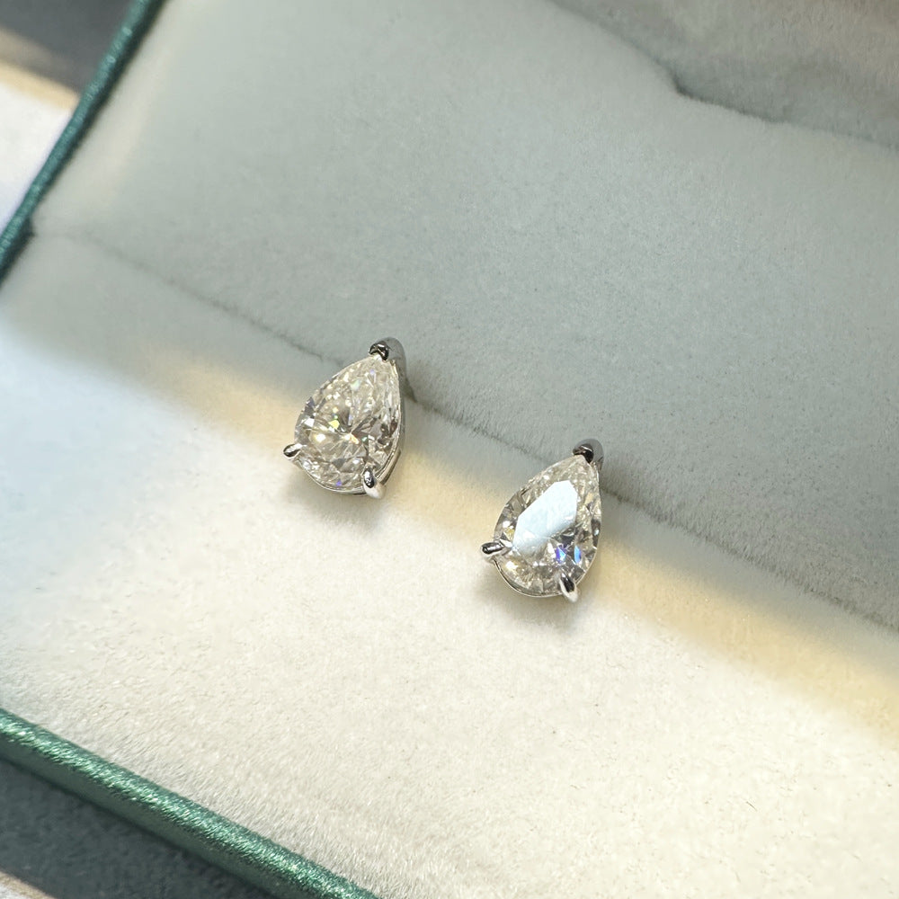 VANLARA Goutte pear moissanite stud earrings in jewelry box angle