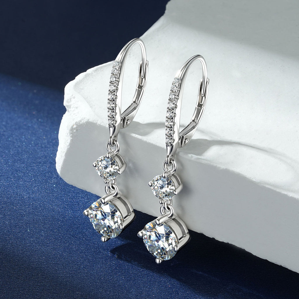 VANLARA moissanite double stone drop earrings on blue and white display