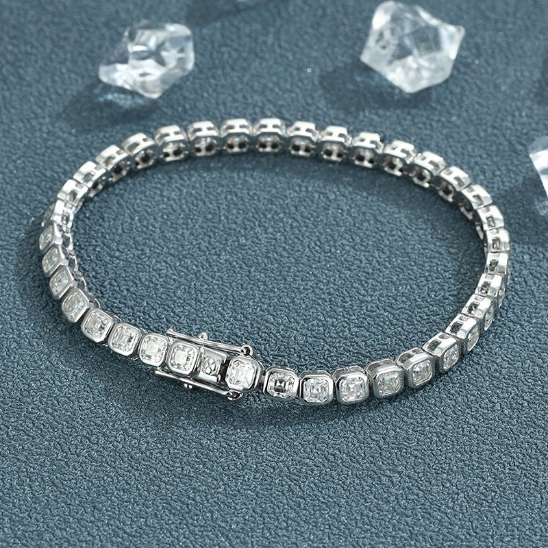 Varenne rhodium plated square moissanite tennis bracelet on textured surface